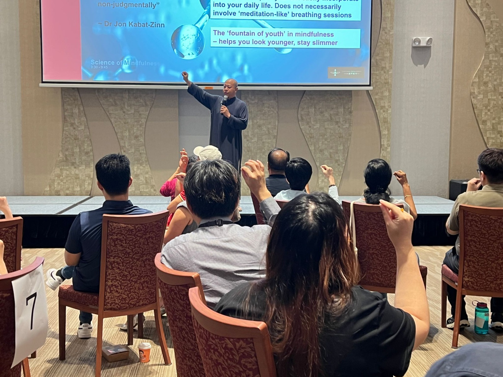 Nadam leading a mindfulness meditation session